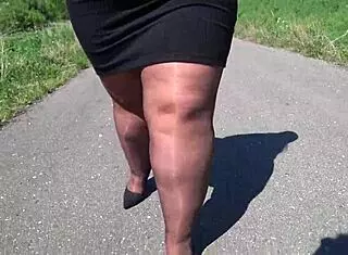 Hey, why's this mature BBW in nylon pantyhose teasing in public?