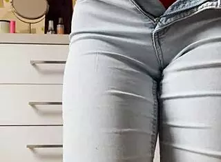 So, this petite 18+ blonde neighbor did a hot striptease in tight jeans. Wild stuff!