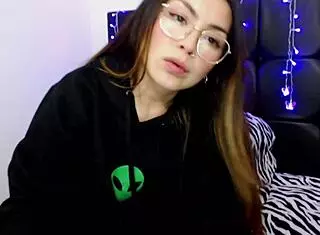 Girl with glasses adds her big dildo