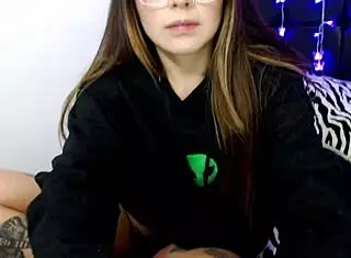 Girl with glasses adds her big dildo