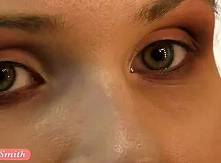 jeny smith poses in red corset and stockings for photoshoot