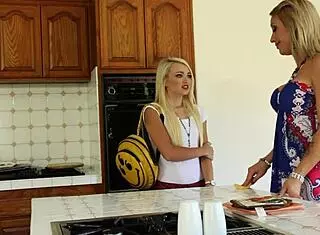 Lesbian Milfs Fulfill Blonde's Fantasies in Threesome