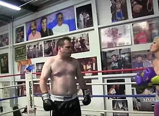 A blonde bombshell engages in mixed boxing
