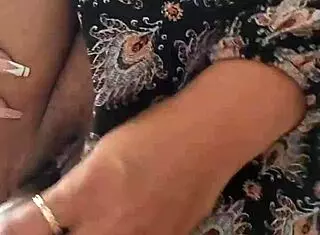 latina with curly hair fucks black dildo on big tits