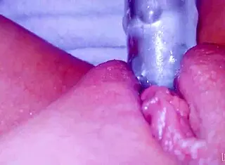 Curious coed cums huge squirt on glasstoy