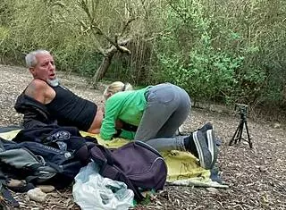 during outdoor excursion with stepbrother, she performs blowjob on mountain and takes cum in mouth