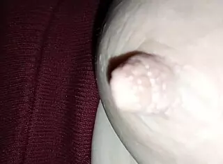 She takes a milk bath from her huge nipples.