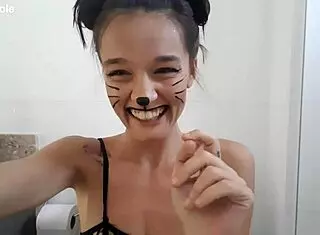 cute skinny girl with small tits engages in bathroom body painting fetish