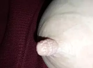 She takes a milk bath from her huge nipples.