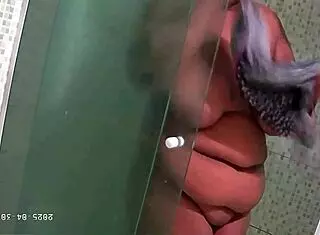 Hidden camera catches bbw milf with big tits and ass