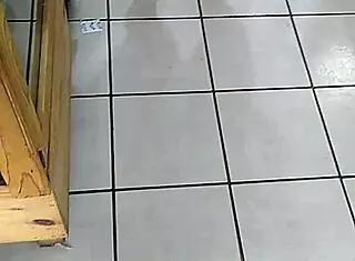 The big ass woman is in the store, looking around.