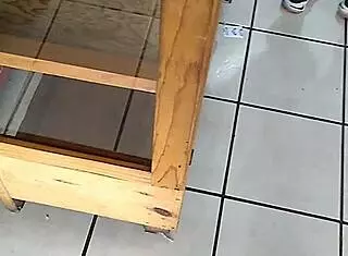 The big ass woman is in the store, looking around.