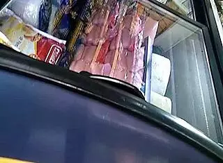 The big ass woman is in the store, looking around.