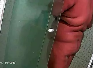 Hidden camera catches bbw milf with big tits and ass