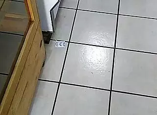 The big ass woman is in the store, looking around.