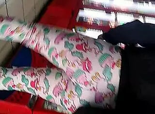 The big ass woman is in the store, looking around.