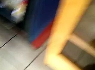 The big ass woman is in the store, looking around.