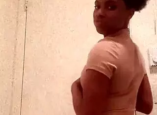 Ebony Girl Reveals Chocolate Ass In Bathroom Setting