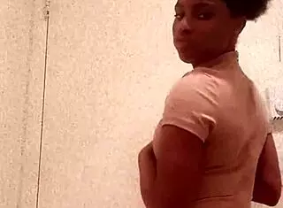 Ebony Girl Reveals Chocolate Ass In Bathroom Setting