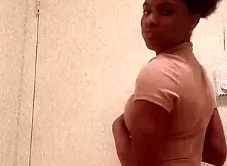 Ebony Girl Reveals Chocolate Ass In Bathroom Setting