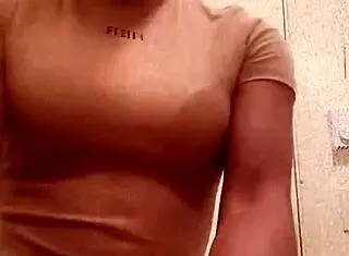 Ebony Girl Reveals Chocolate Ass In Bathroom Setting