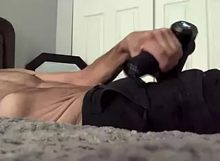 Solo male massages pelvis in homemade therapeutic workout clip.