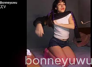 Bonneyuwu Masturbates On Bed With Transparent Dildo.