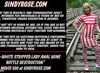 Red-white striped lady in public gets clothes ripped for extreme anal bottle insertion.