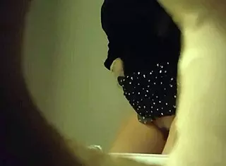 hidden cam captured sexy white panties babe peeing through a wall hole