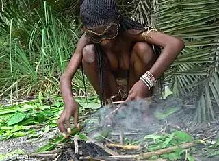 Hot African Native Woman Cooking In The Jungle With Small Waist And Skinny Body
