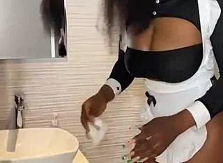 Ebony maid rides boss