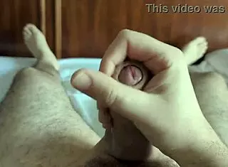 I do a soft jerk off in the bedroom before a nap, close up on my cock and feet.