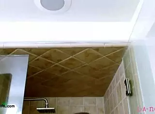 fierce brunette enjoys a relaxing shower