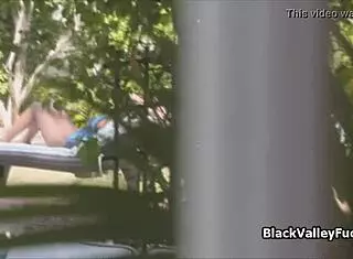 Ebony teen princess gives detailed blowjob to monster cock by outdoor pool