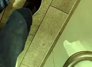 boldly getting naked and masturbating big cock in public toilet