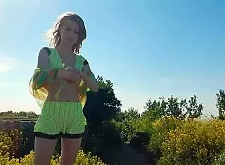 Spunky Teen Model Undresses Outdoors In Miniskirt