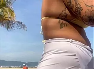 Oh no, these shorts are showing my big pussy at the beach!