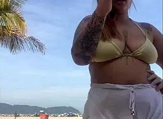 Oh no, these shorts are showing my big pussy at the beach!