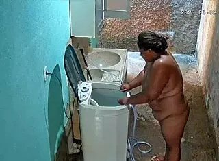 hidden camera catches stepmother bathing and showing off in backyard