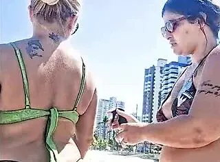 Blonde And Friend Flashing On Beach Exhibition