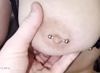 Exploring tweezers on natural tits in bdsm session