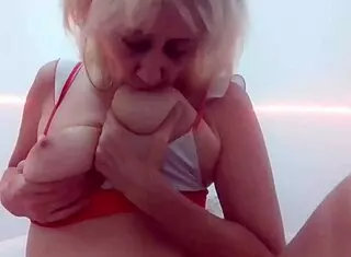 Stella sucks her own hot soft delicious big tits full on red!