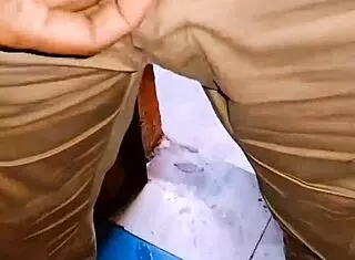 tanned arab explores outdoor spots with flashing lights and romantic vibes