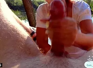 A MILF jerks off a stranger outdoors for cash in POV