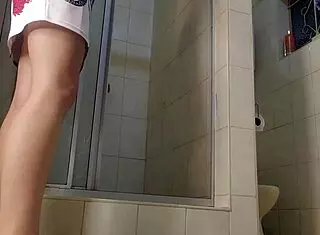 Petite teen flashes pussy while sucking monster cock