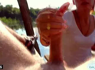 A MILF jerks off a stranger outdoors for cash in POV