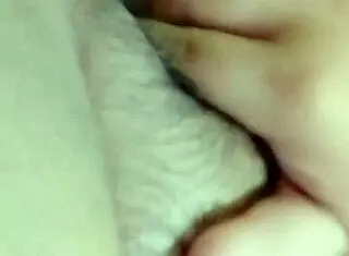 Young woman masturbates in private setting