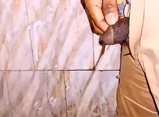 tanned arab explores outdoor spots with flashing lights and romantic vibes