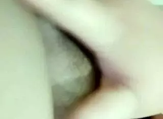 Young woman masturbates in private setting