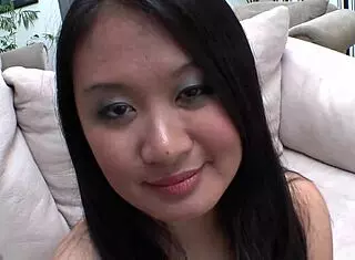 Plump Asian squirts on couch during intense fingering and fucking